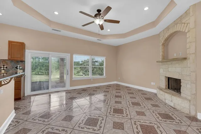 a view of an entryway with wooden floor and a chandelier