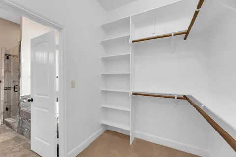 a bathroom with a sink vanity and a mirror
