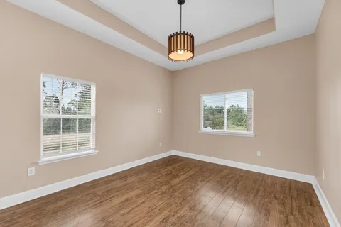 a bathroom with a toilet a sink and shower