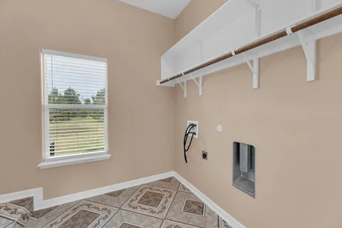 a view of a big room with wooden floor