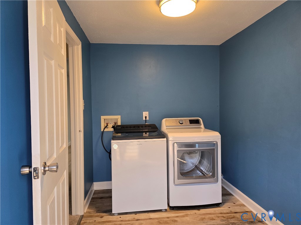 4600 Painted Post Lane Midlothian, VA 23112 - Photo 14 of 44 a utility room with dryer and washer