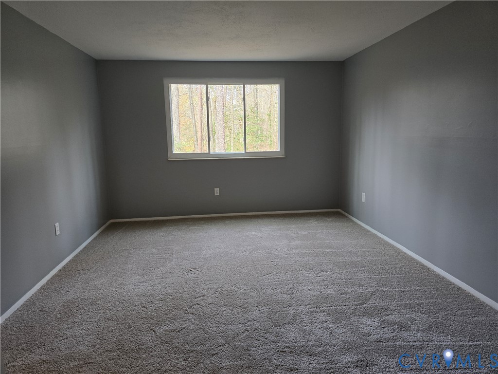 4600 Painted Post Lane Midlothian, VA 23112 - Photo 22 of 44 an empty room with a window