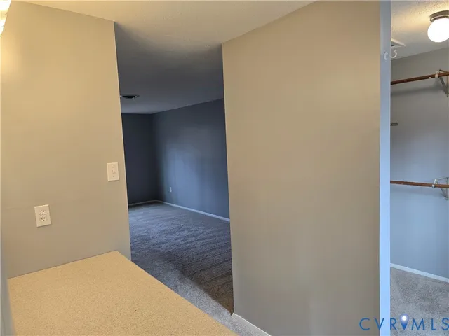 a room with closet and window