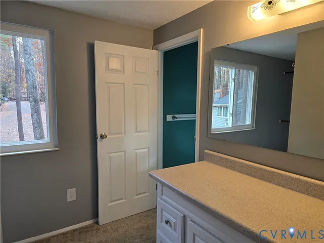 a room with closet and window