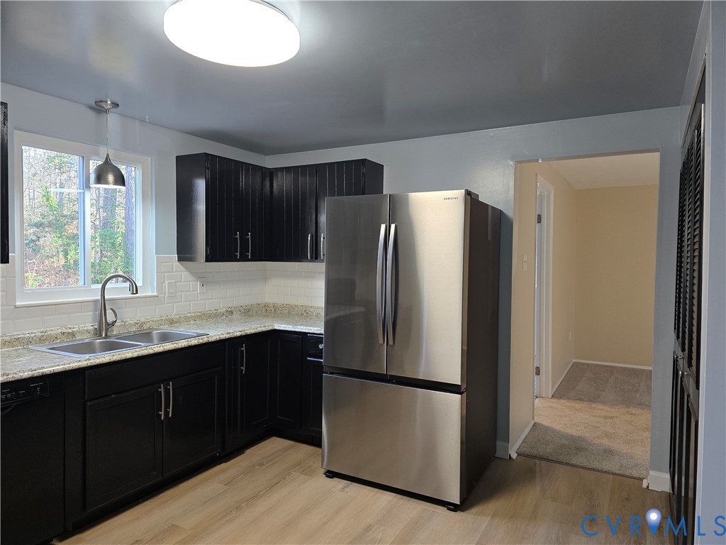 4600 Painted Post Lane Midlothian, VA 23112 - Photo 4 of 44 a kitchen with refrigerator and sink