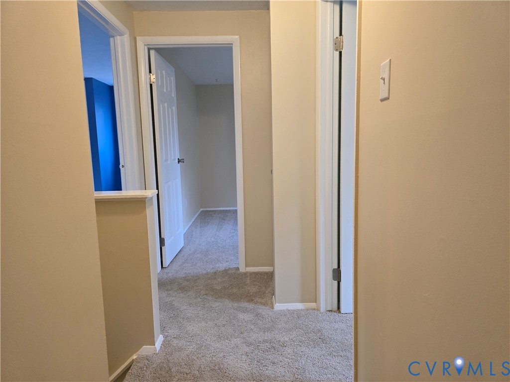 4600 Painted Post Lane Midlothian, VA 23112 - Photo 44 of 44 a view of a hallway with wooden floor