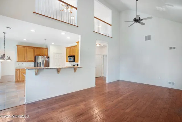a view of a kitchen with a sink