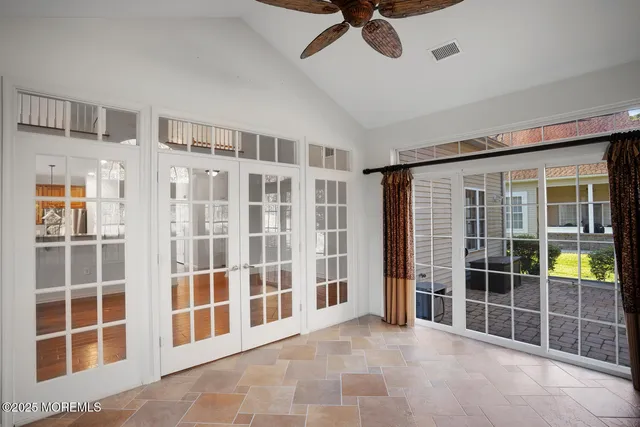 a view of empty room with windows