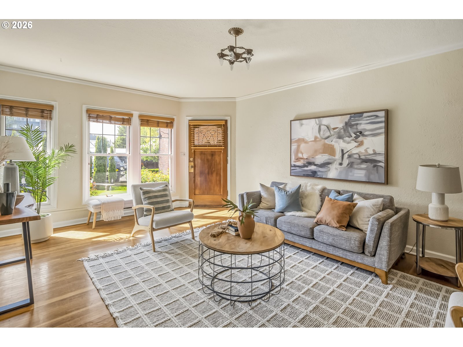 4353 Northeast Halsey Street, Unit 4 Portland, OR 97213 - Photo 2 of 24 a living room with furniture and a large window