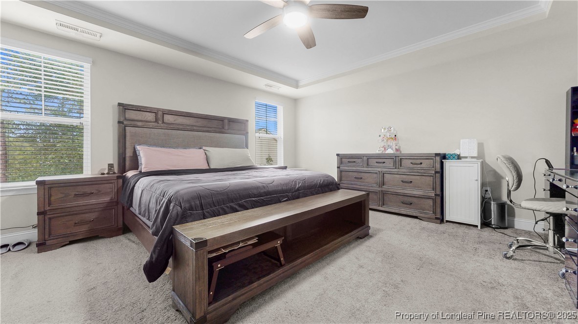 493 Timber Skip Drive Spring Lake, NC 28390 - Photo 17 of 33 a bedroom with a bed and furniture