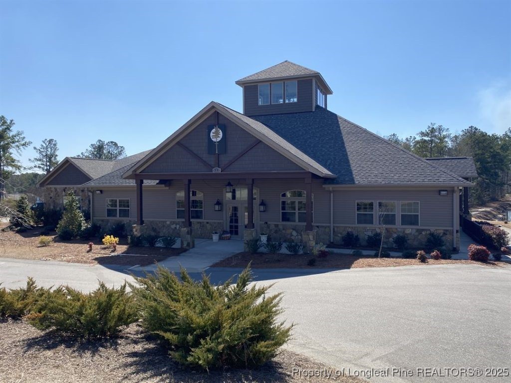 493 Timber Skip Drive Spring Lake, NC 28390 - Photo 32 of 33 a front view of a house with a yard