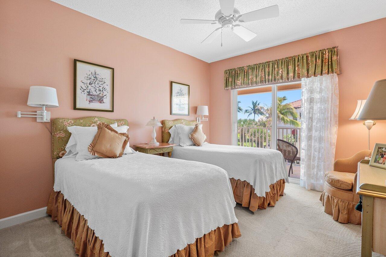 5900 Old Ocean Boulevard, Unit C6 Ocean Ridge, FL 33435 - Photo 12 of 21 a bedroom with double bed and a window