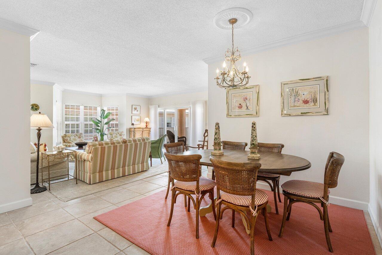5900 Old Ocean Boulevard, Unit C6 Ocean Ridge, FL 33435 - Photo 17 of 21 a view of a dining room with furniture window and outside view