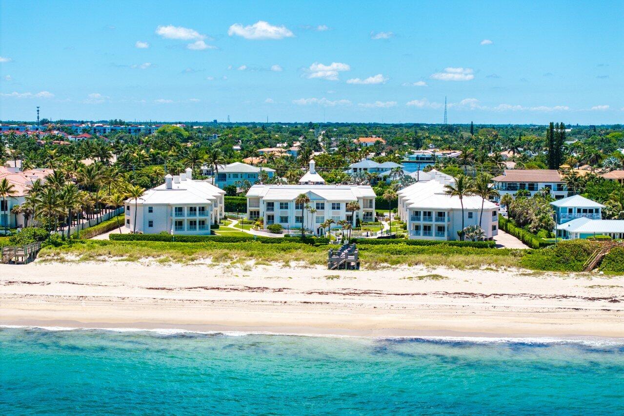 5900 Old Ocean Boulevard, Unit C6 Ocean Ridge, FL 33435 - Photo 2 of 21 a view of city with lawn chairs and large trees
