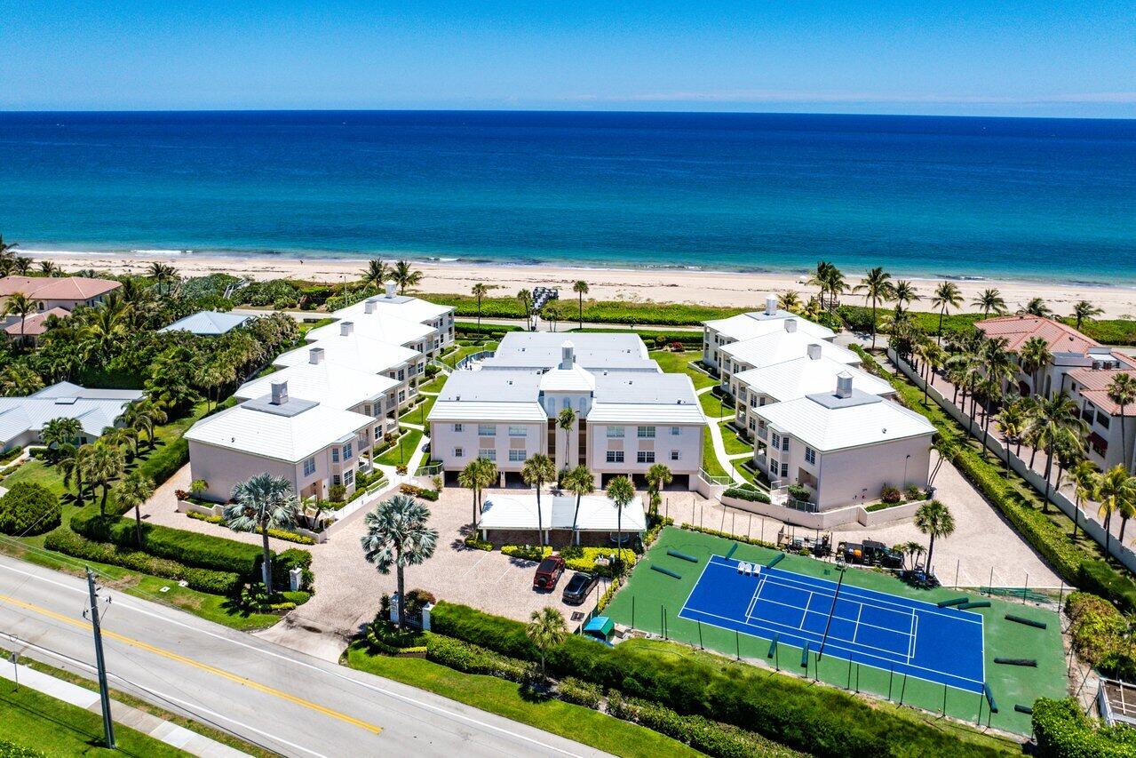 5900 Old Ocean Boulevard, Unit C6 Ocean Ridge, FL 33435 - Photo 4 of 21 an aerial view of a house with a garden