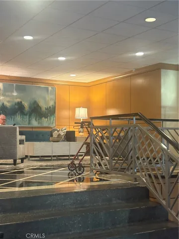 a view of a floor to ceiling window and wooden floor