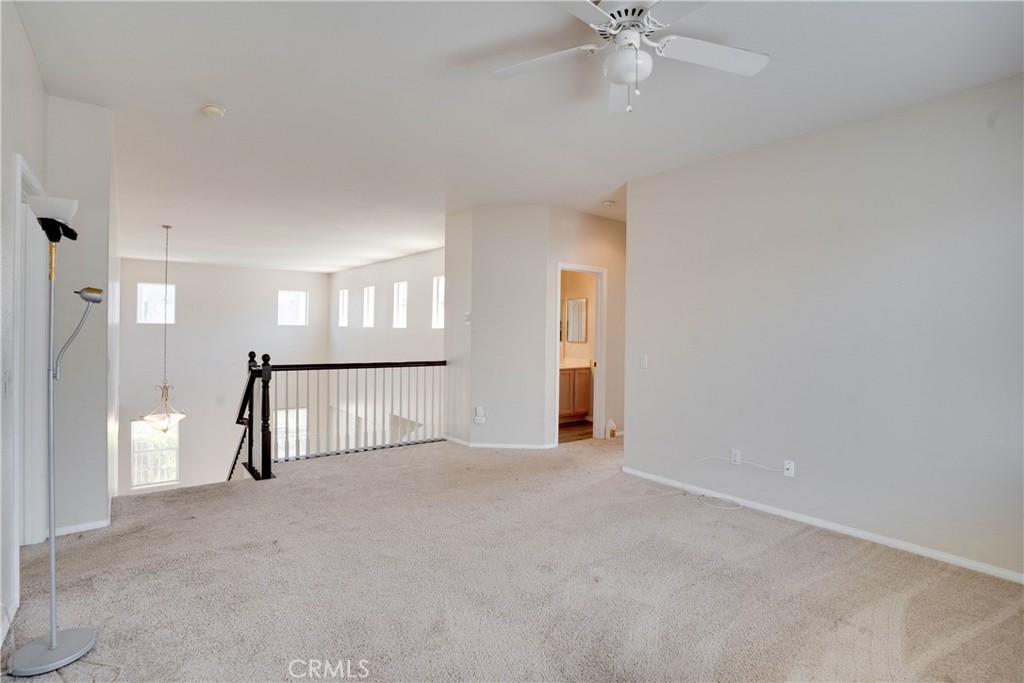 33440 Barrington Drive Temecula, CA 92592 - Photo 40 of 72 a view of an empty room with a window