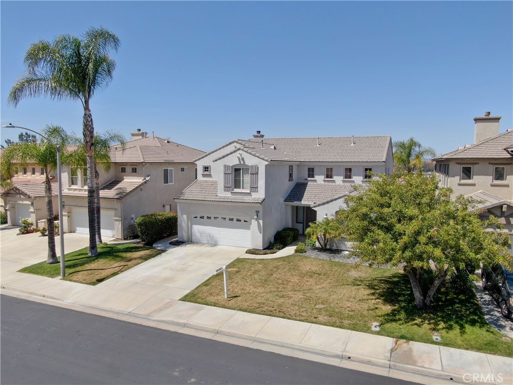 33440 Barrington Drive Temecula, CA 92592 - Photo 5 of 72 front view of a house with a yard