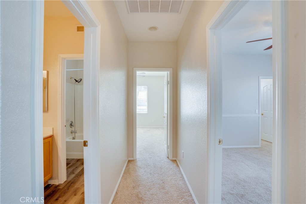 33440 Barrington Drive Temecula, CA 92592 - Photo 52 of 72 a view of a bathroom from a hallway