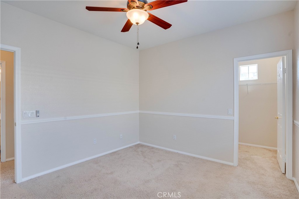 33440 Barrington Drive Temecula, CA 92592 - Photo 54 of 72 a view of an empty room with a fan