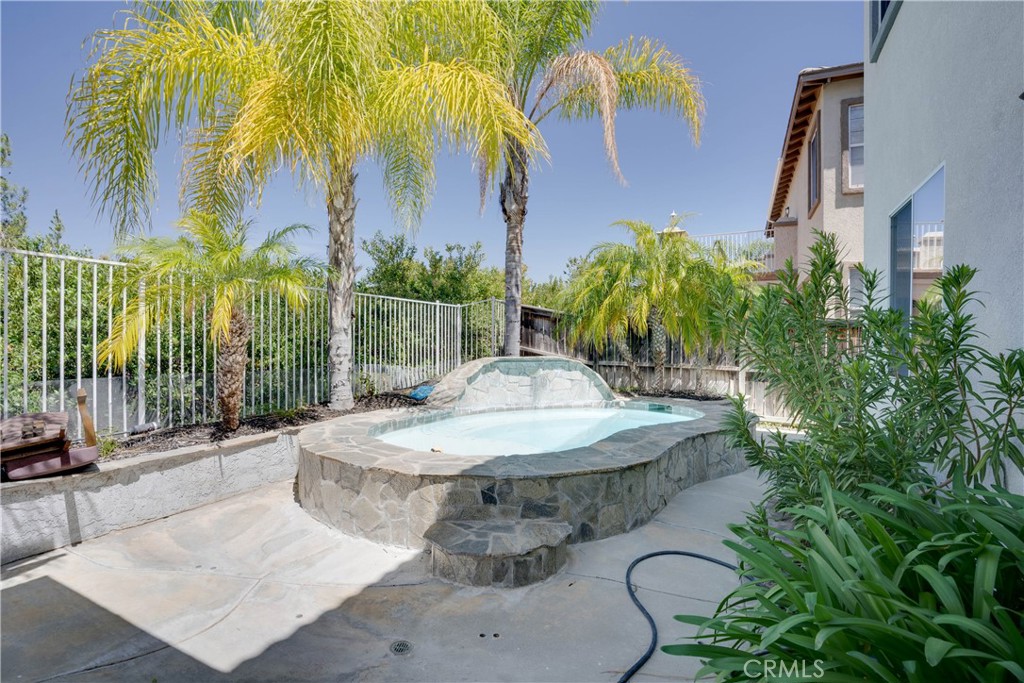 33440 Barrington Drive Temecula, CA 92592 - Photo 63 of 72 a view of a backyard with plants and palm tree