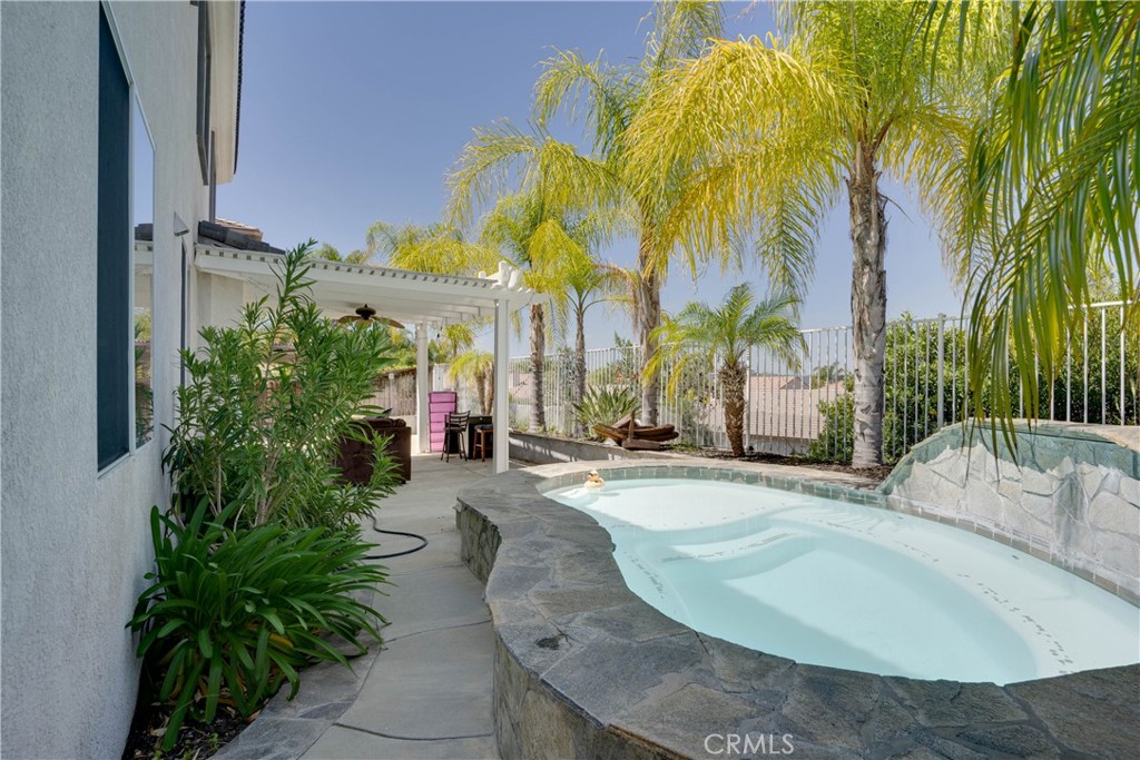 33440 Barrington Drive Temecula, CA 92592 - Photo 68 of 72 a swimming pool with outdoor seating and yard