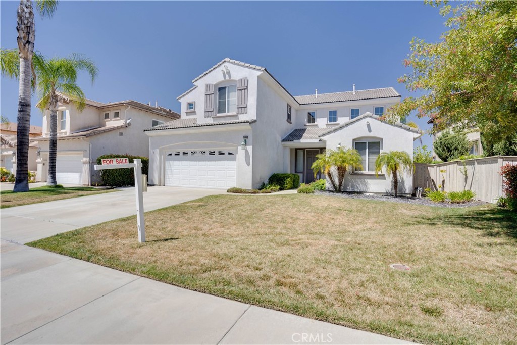 33440 Barrington Drive Temecula, CA 92592 - Photo 70 of 72 a front view of a house with a yard