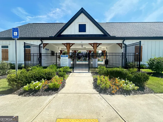 a front view of a house having yard