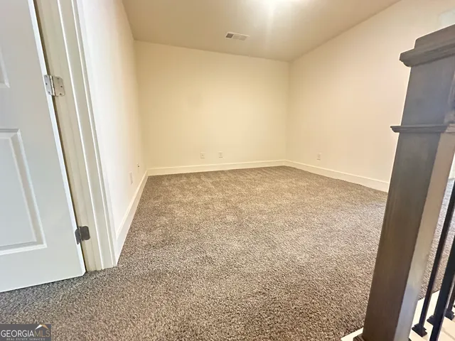an empty room with a door