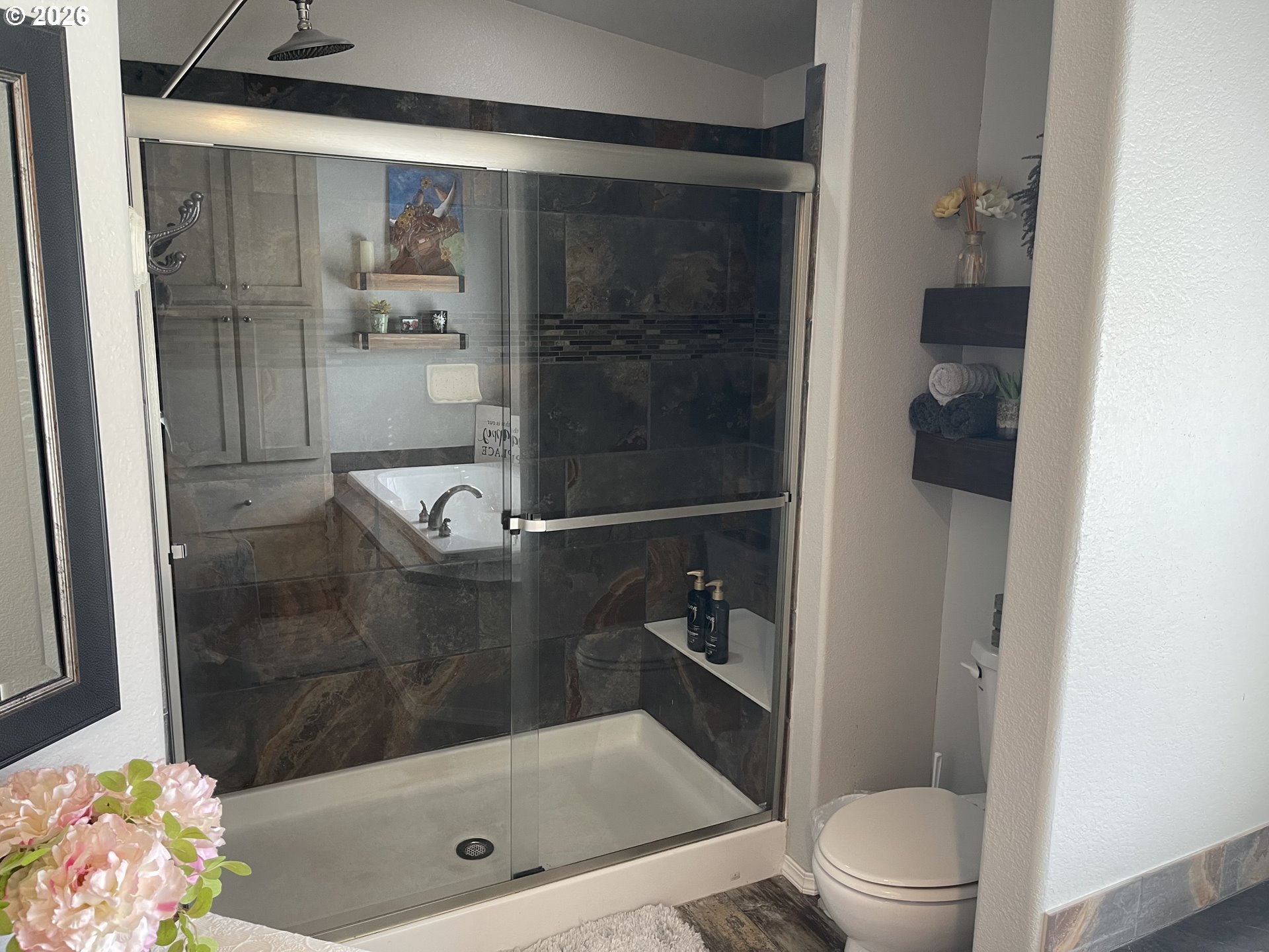 6404 Lookingglass Road Roseburg, OR 97471 - Photo 20 of 48 a bathroom with a shower and toilet