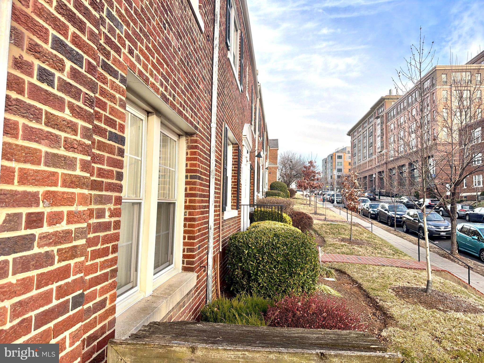 Charming brick facade in a vibrant neighborhood.