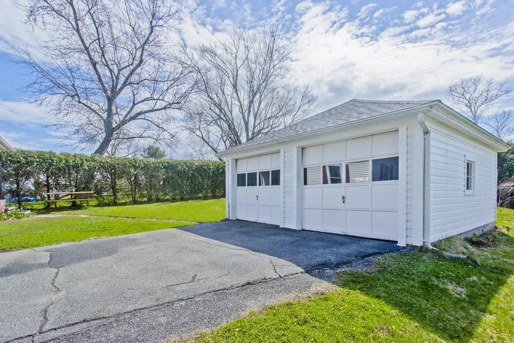 2078 Pleasant Street Three Rivers, MA 01080 - Photo 27 of 27 a front view of house with yard and big trees