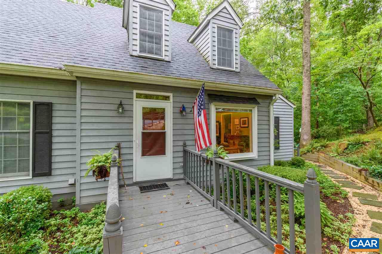 a front view of house with an trees