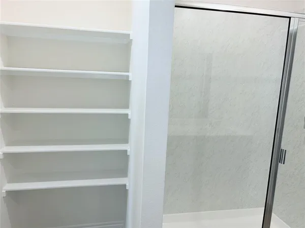 a view of small space with racks on the wall