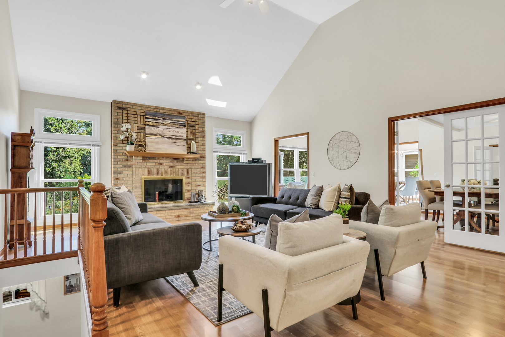 1075 Suffolk Court Gurnee, IL 60031 - Photo 12 of 51 a living room with furniture fireplace and a large window