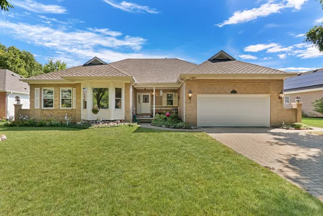 front view of a house with a yard