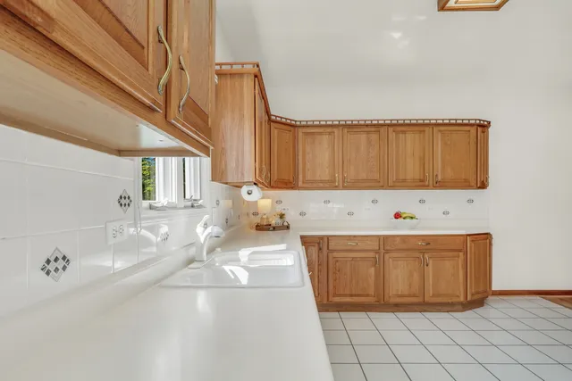 a bathroom with a sink a mirror and a bathtub