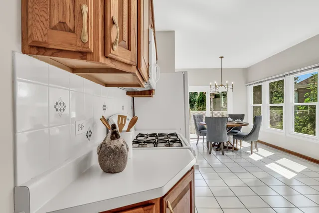 a view of dining room with furniture and window