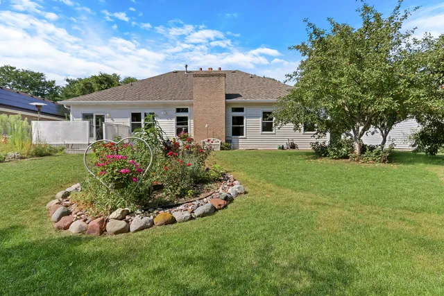 a front view of house with garden