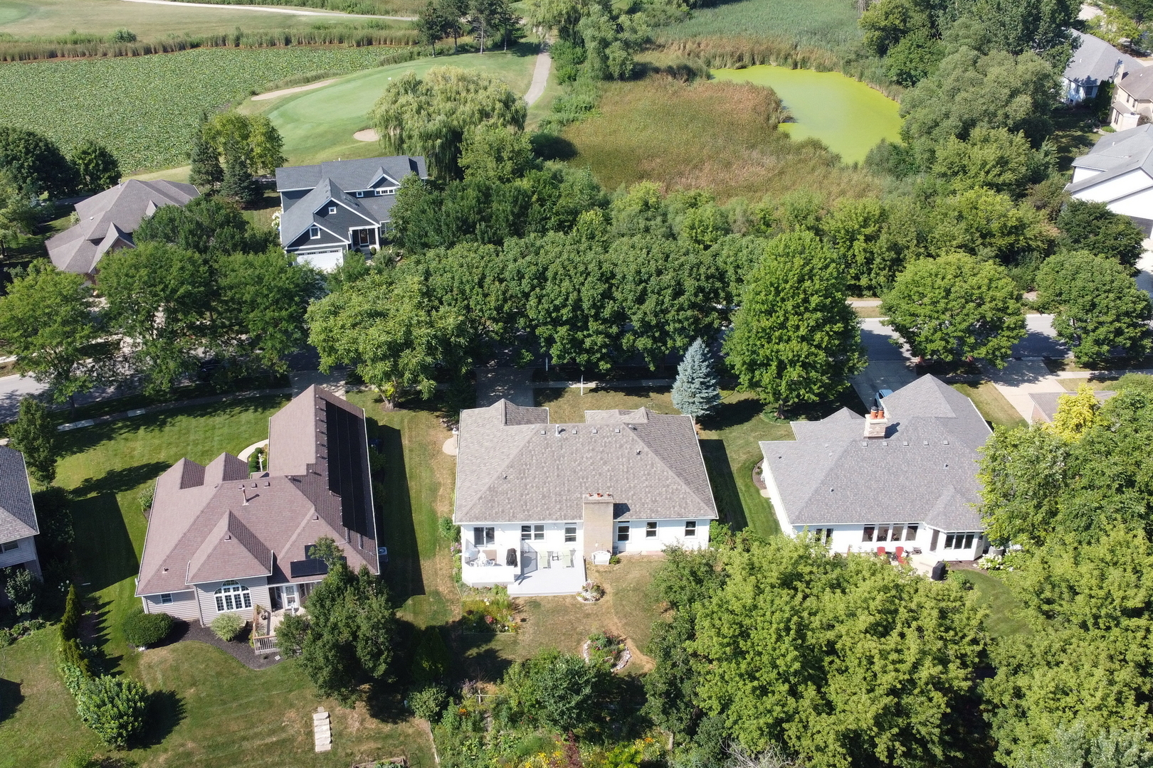 1075 Suffolk Court Gurnee, IL 60031 - Photo 8 of 51 an aerial view of a house with outdoor space and lake view