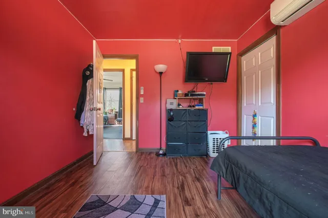 a view of a living room with a flat screen tv
