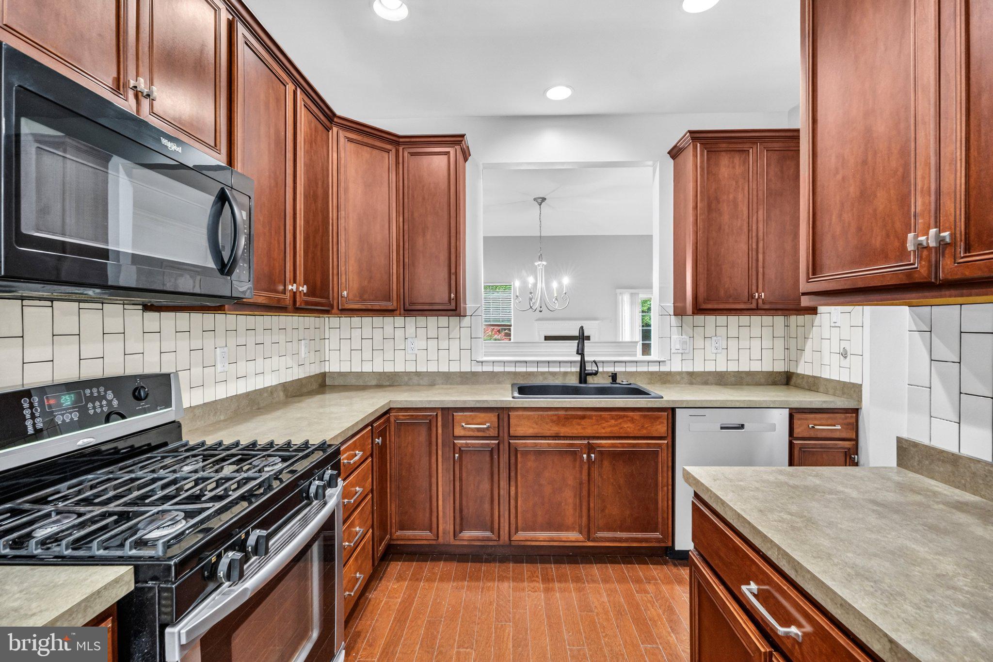 161 Stoyer Road Coatesville, PA 19320 - Photo 10 of 52 Modern kitchen with rich wood accents.