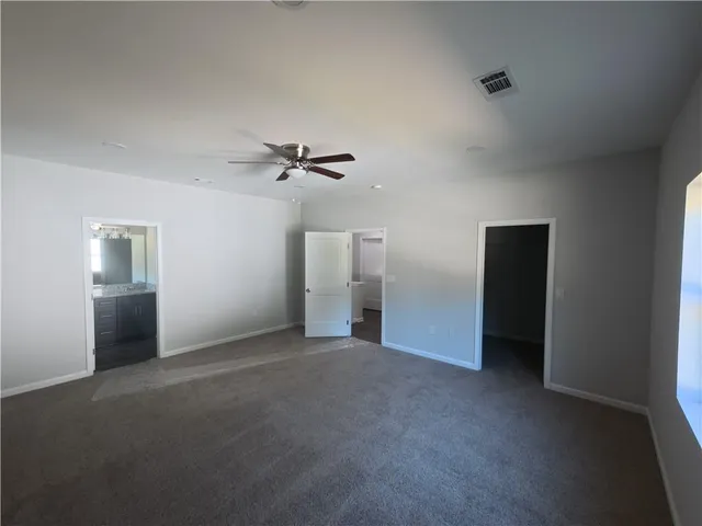 a view of a room with an empty space