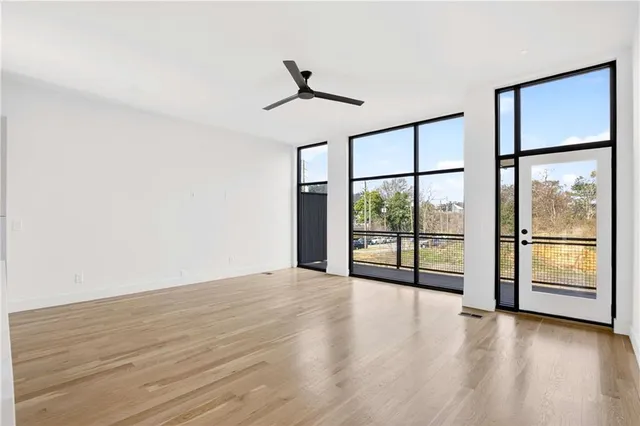 a view of an empty room with a window