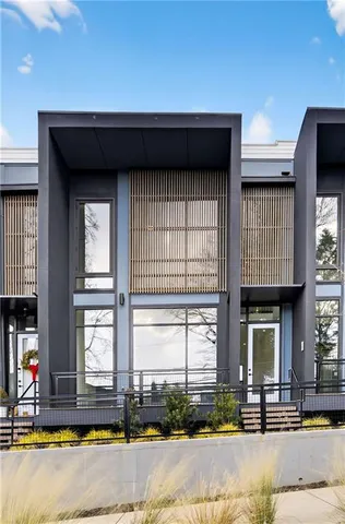 a view of a brick building with many windows