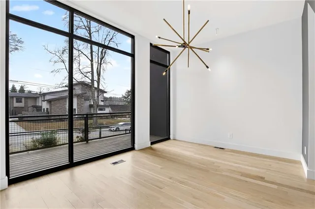 a view of a room with a large window