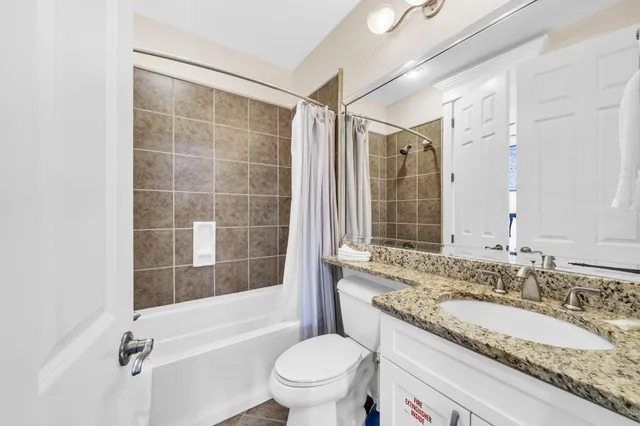 a view of a hallway with washer and dryer