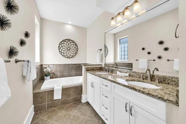 a view of a balcony with chairs