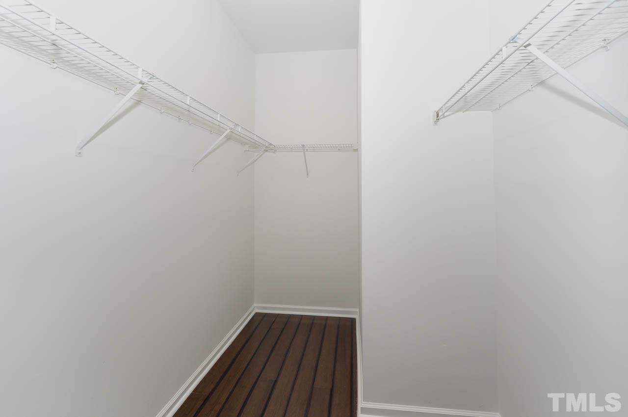 1917 Barngate Way Raleigh, NC 27614 - Photo 7 of 10 a view of small space with racks on the wall