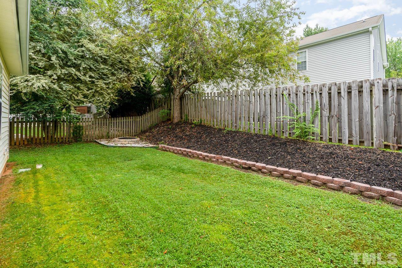 1917 Barngate Way Raleigh, NC 27614 - Photo 10 of 10 a view of a backyard with a garden